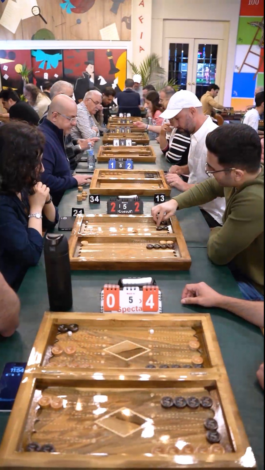 Photo of people playing backgammon in a backgammon competition